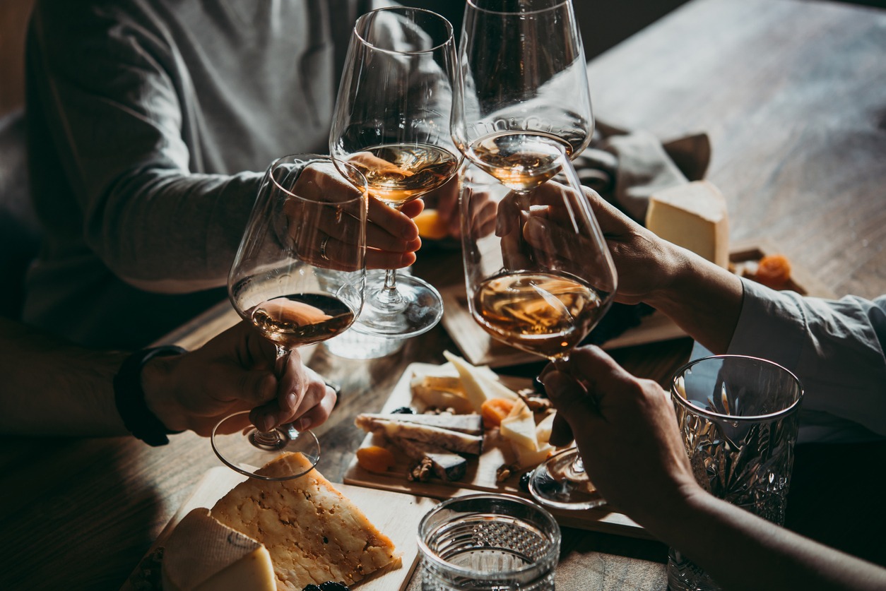 Wine and cheese served for a friendly party in a bar or a restaurant