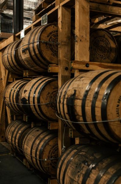 wine barrels on a wooden rock
