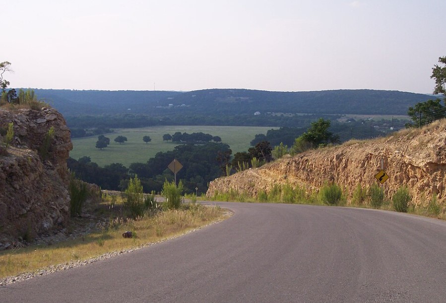 A view of the Texas Hill Country from a rural road in Hays County