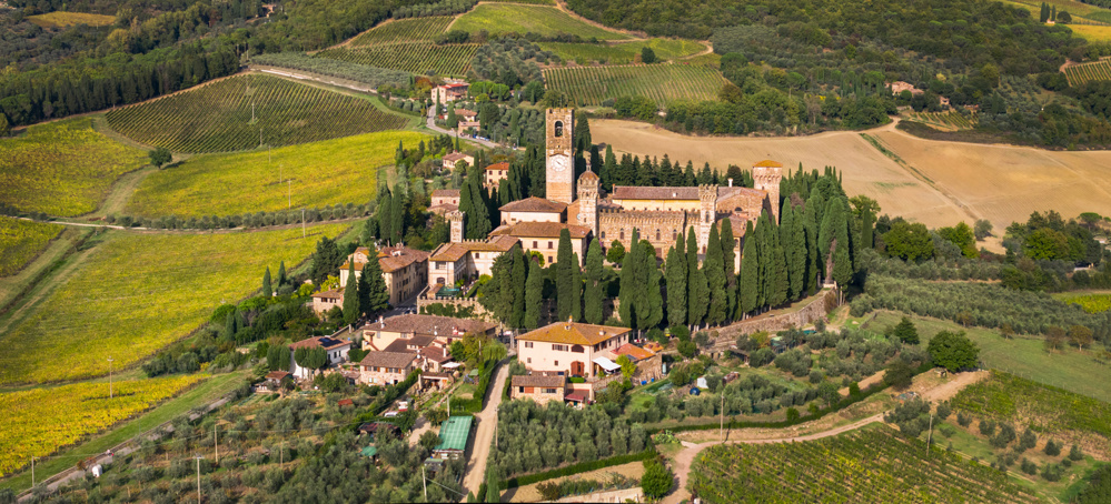 Italy, wine region Chianti in Tuscany, View of medieval village and abbey Badia in Passignano famous for his wine Chianti Classico