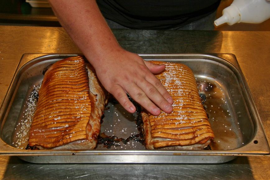 pork loin being prepared for roasting