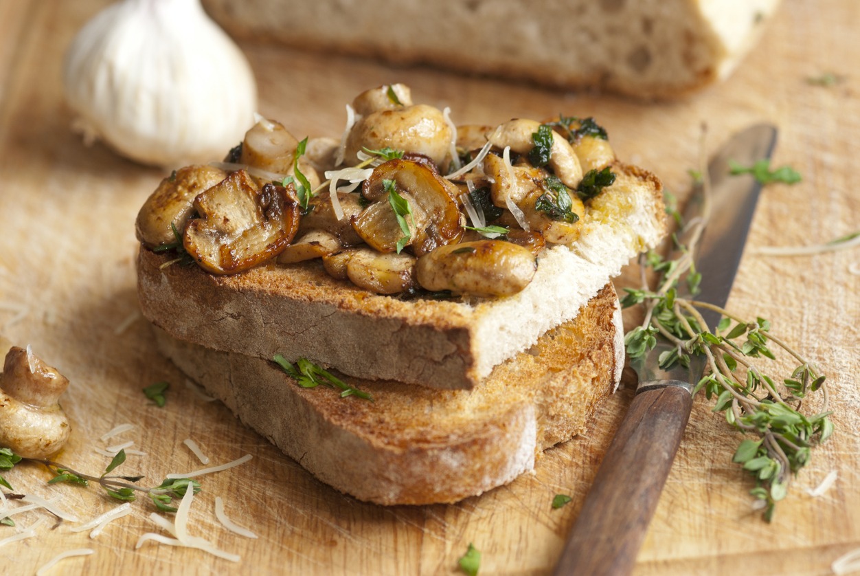 Mushrooms with herbs on toasts