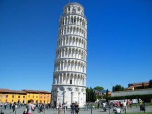 Leaning Tower of Pisa, numerous people, blue skies