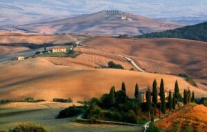 Tuscany landscape, hills, trees, houses, roads, bushes, fields