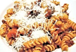 fusilli pasta with ragu meat sauce